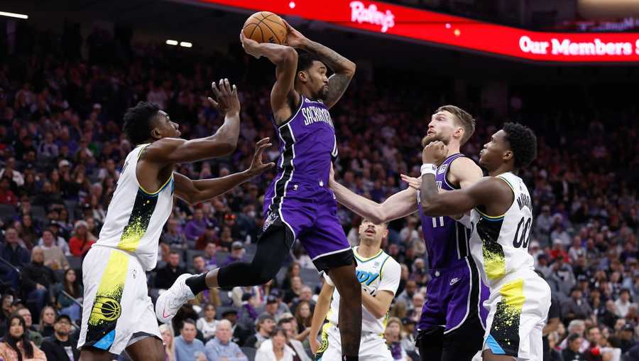 SACRAMENTO, CALIFORNIA - DECEMBER 22: Malik Monk #0 of the Sacramento Kings looks to pass the ball against Thomas Bryant #3 of the Indiana Pacers in the fourth quarter at Golden 1 Center on December 22, 2024 in Sacramento, California. NOTE TO USER: User expressly acknowledges and agrees that, by downloading and or using this photograph, User is consenting to the terms and conditions of the Getty Images License Agreement. (Photo by Lachlan Cunningham/Getty Images)